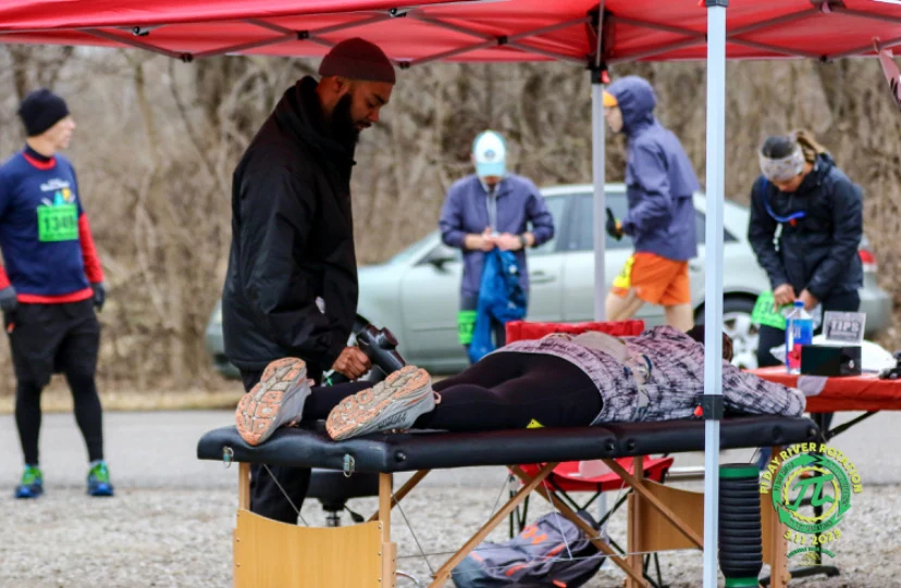 Recovery bodywork at an outdoor athletic event